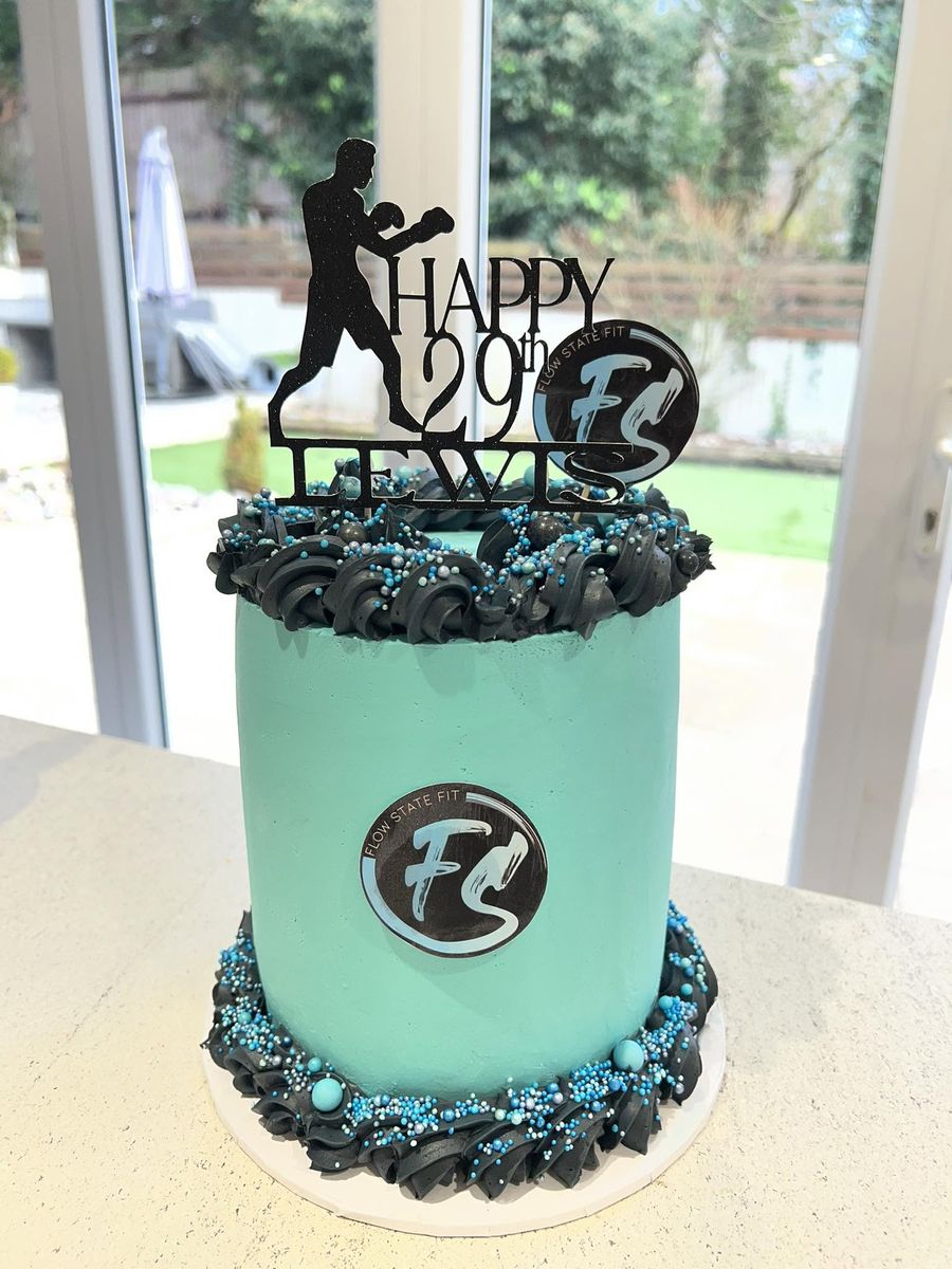 Kickboxing 29th cake by Just In Cakes Co. Mint buttercream, black piping and a club logo.