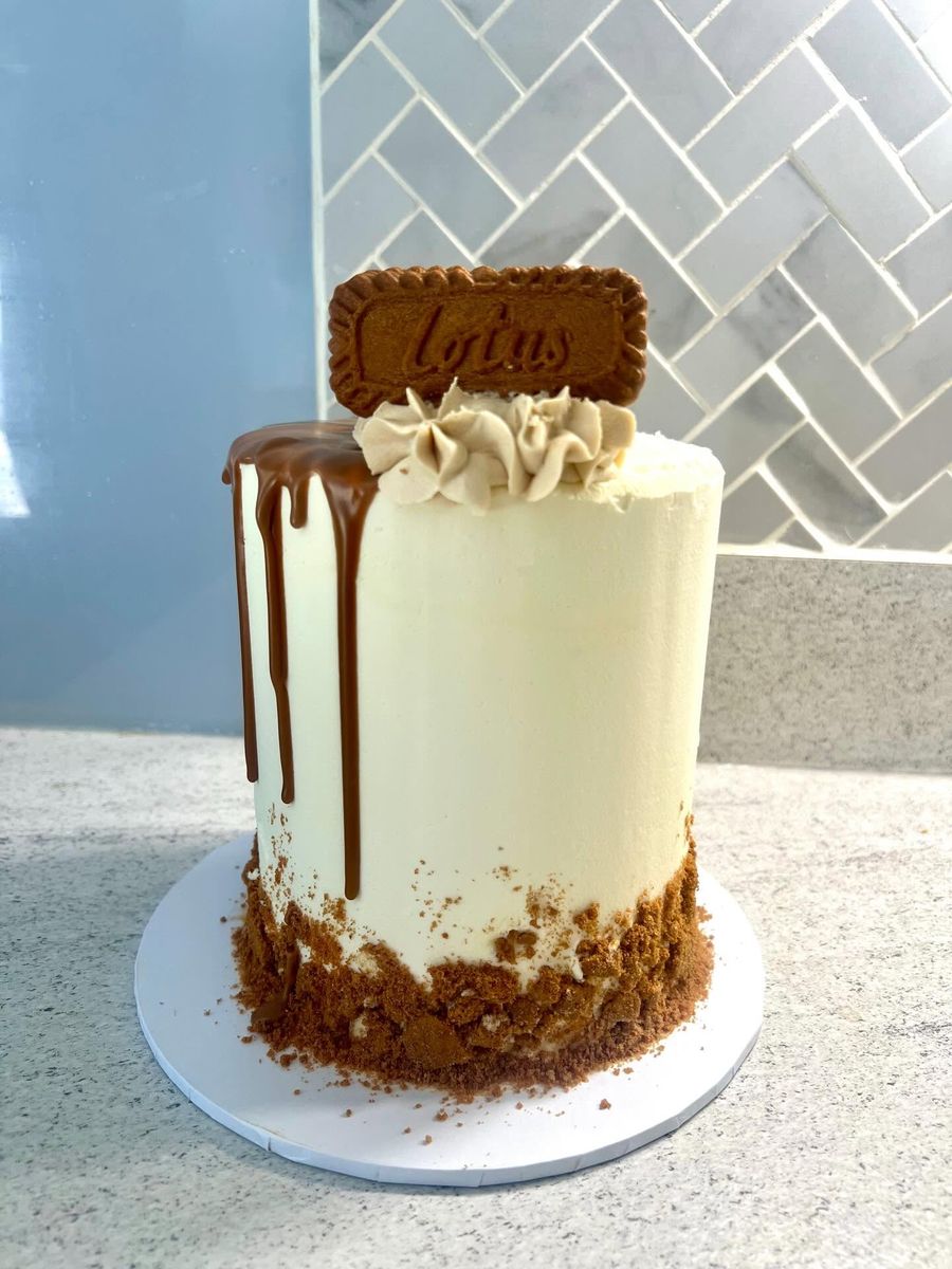 Caramelised biscuit drip cake by Just In Cakes Co. A caramelised biscuit drip and crumb, with a biscuit on top.