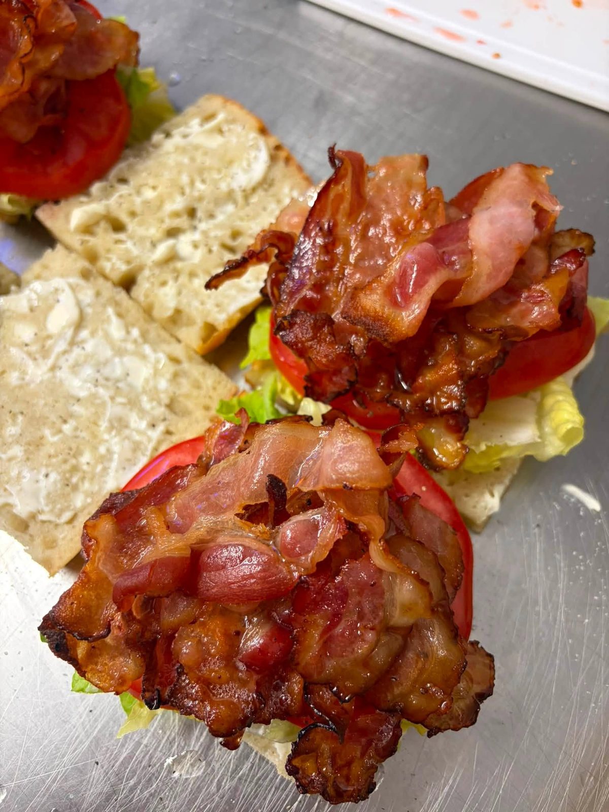 Focaccia sandwich filled with bacon, lettuce and tomato