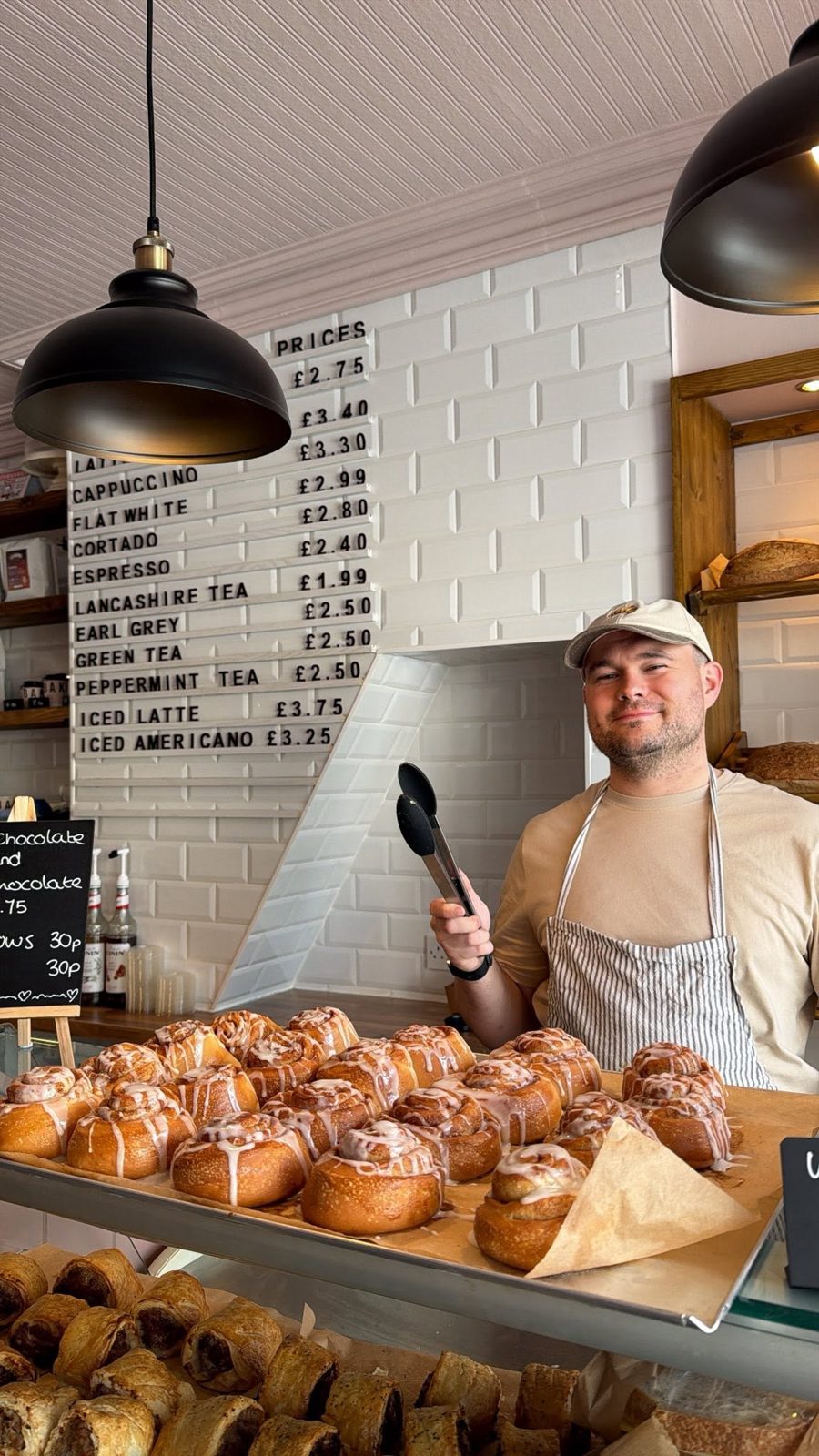 Behind the counter with fresh bakes on display