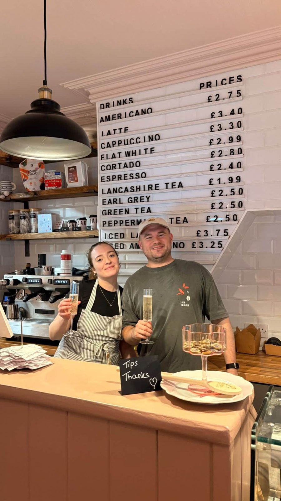 Emma and Taylor, the two owners of Just In Cakes Co., behind the counter