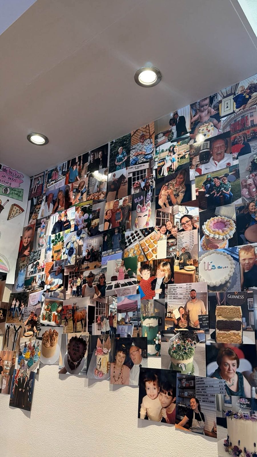 The wall of family photos inside the bakery
